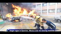Protesters burn state congress over Mexico 'massacre'