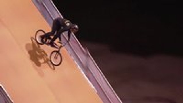 Scooter rider performs a world first BMX trick