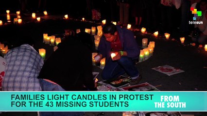 Mexican families light candles of hope for the 43 students