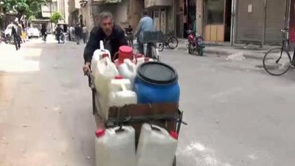 Fighting traps thousands in Syrian rebel city