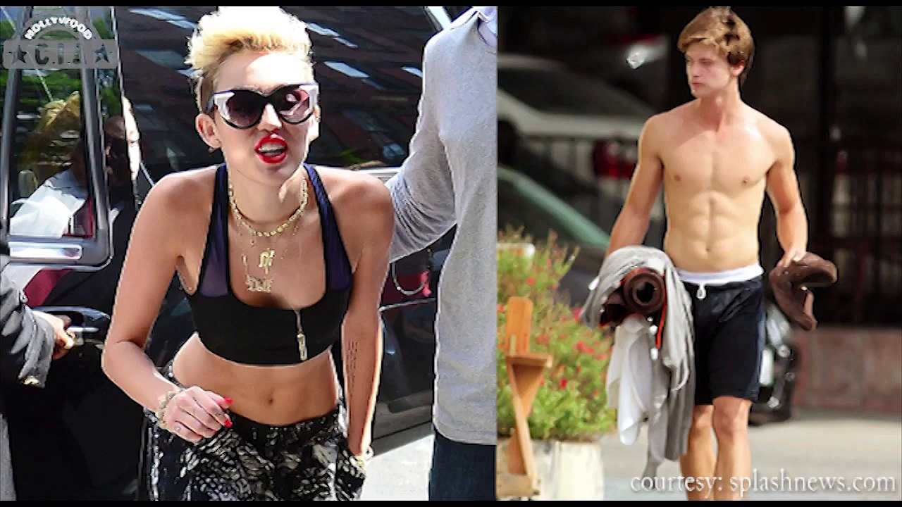 Miley Cyrus & Patrick Schwarzenegger Caught Kissing & Smooching At USC Football Game – Too Much PDA