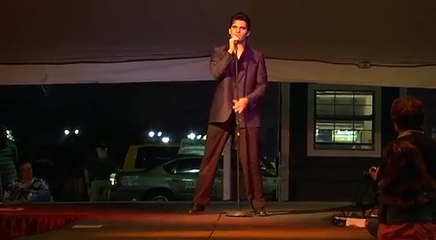 Cody Slaughter encouraging the audience to scream hoot and holler at Elvis Week video