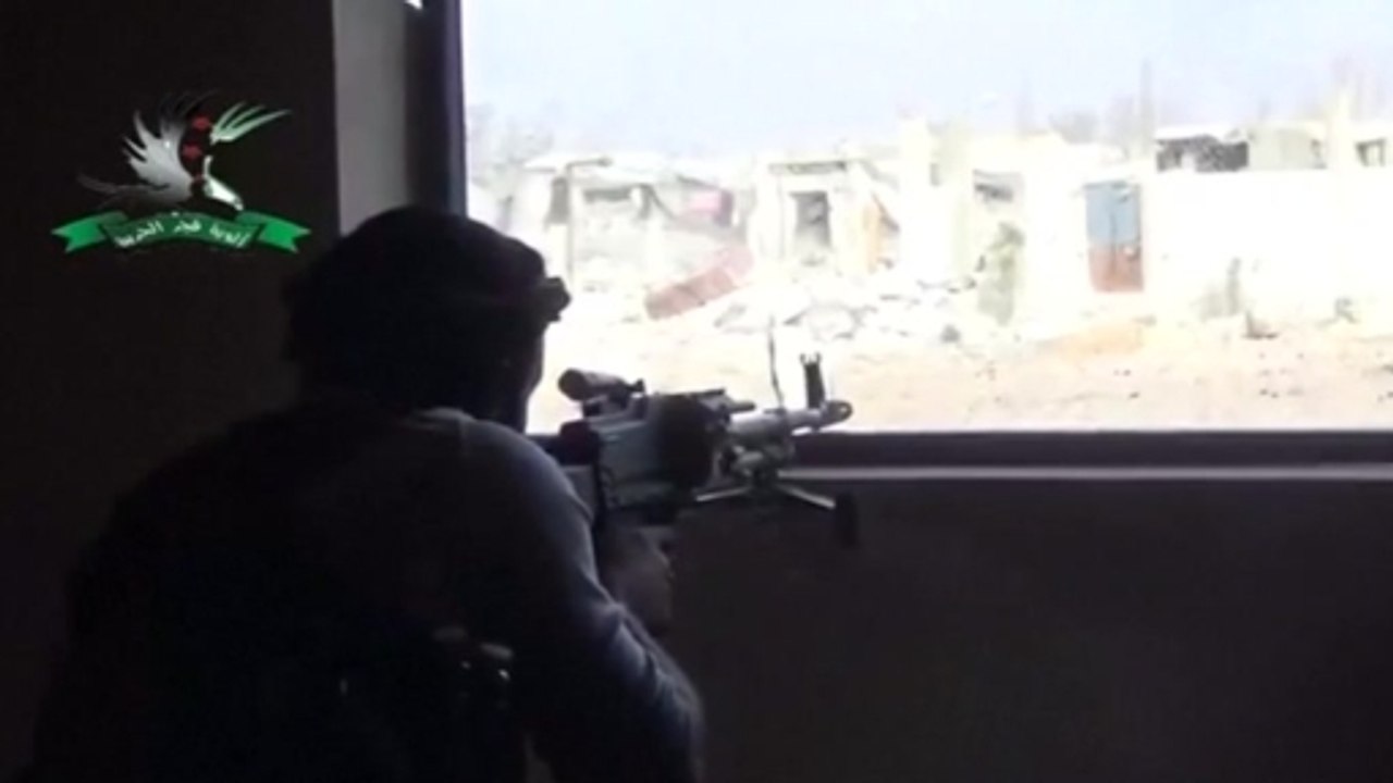 Kobani fighters battle "war criminals" Islamic State
