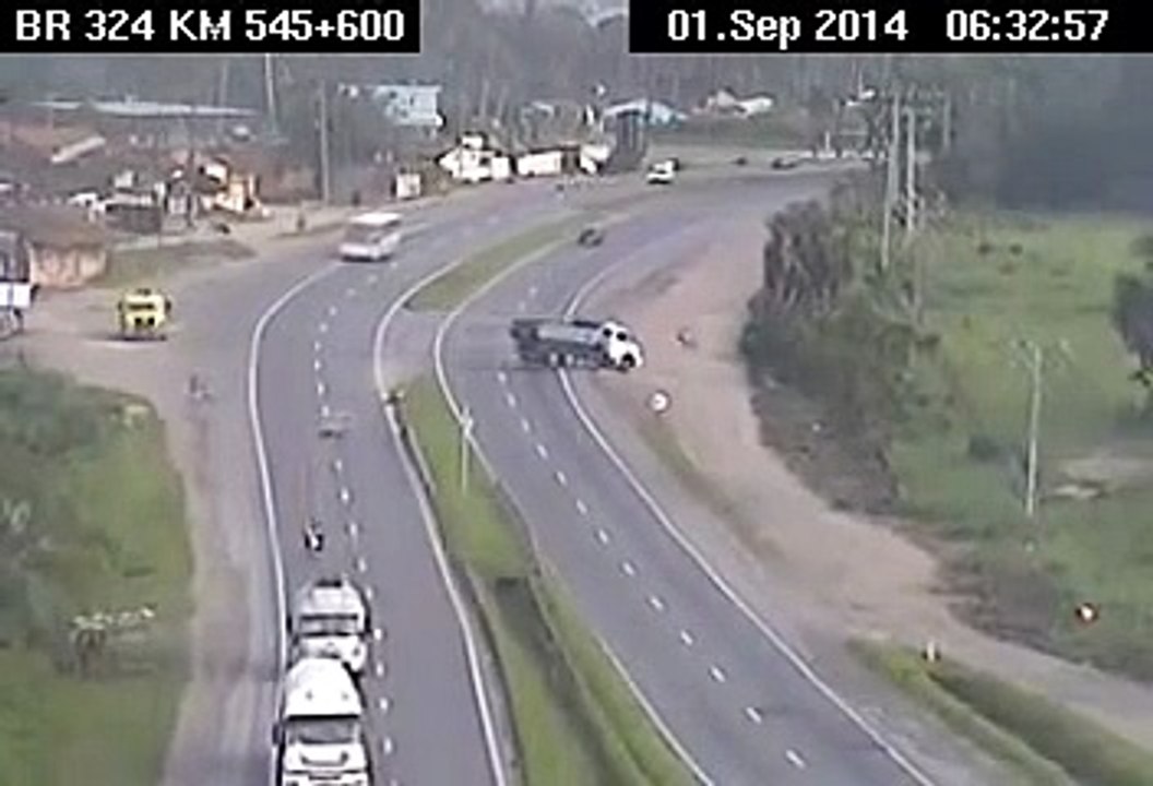 Guy Slides Under Truck That Cut Him Off