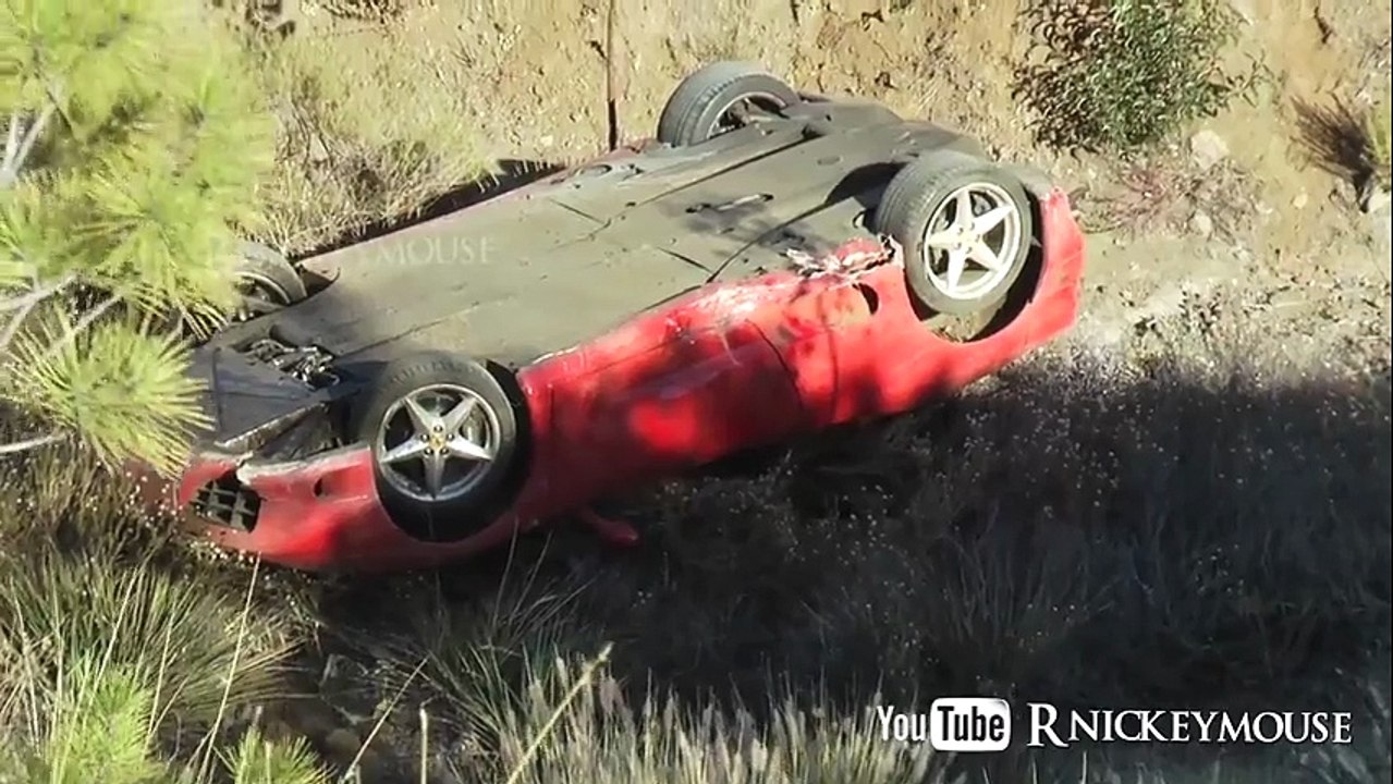 Ferrari Crashes And Tumbles Down Steep Enbankment
