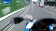 Biker doing wheelie is busted by police and it's all caught on camera