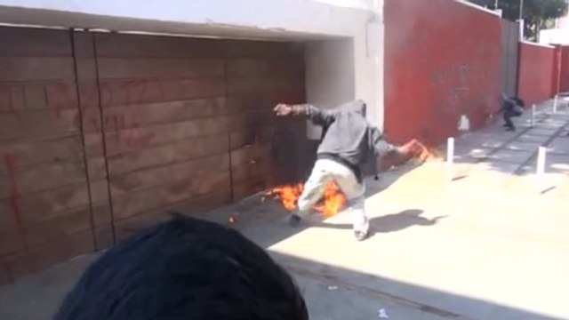 Protesters attack governing party offices in Oaxaca as anger boils over missing students