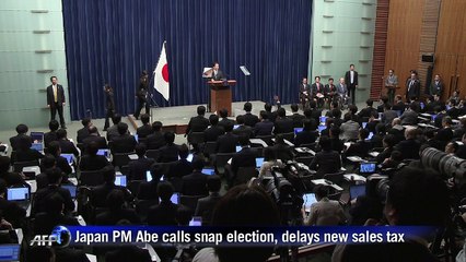 Abe calls snap Japan poll, delays tax hike