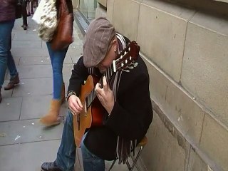 classical guitar player at saint annes square manchester uk