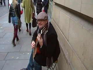 classical guitar player at saint annes square manchester uk