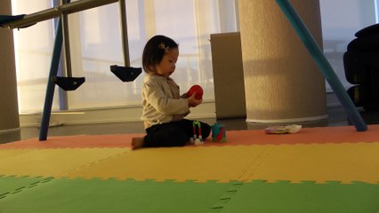 Girl Playing Elmo Toy