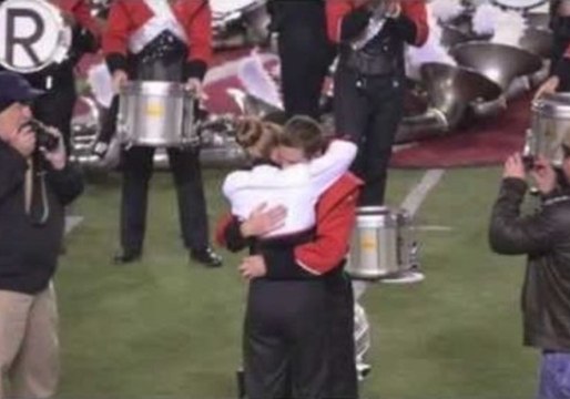 Man Hides Amongst Marching Band to Spring Romantic Proposal