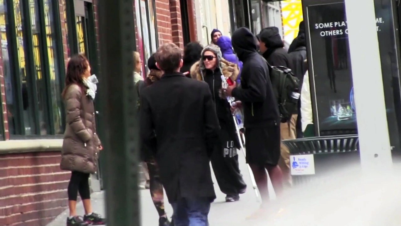 Madonna hobbles on crutches in NYC