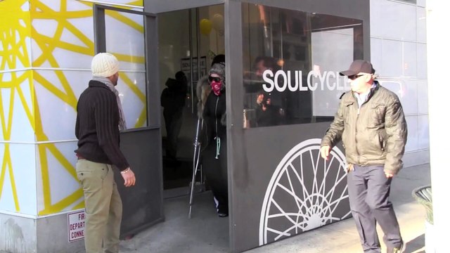 Madonna hides face with bandana while hobbling with crutches in NYC