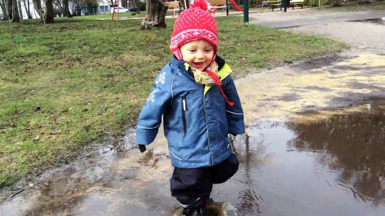 Baby falling in puddle
