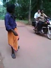 drunk man dancing on street and falls in drain