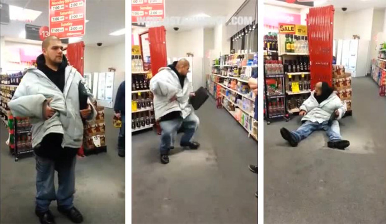 Un homme ivre vole des bouteilles d'alcool dans un magasin