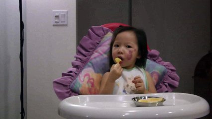 Girl Eating Oranges