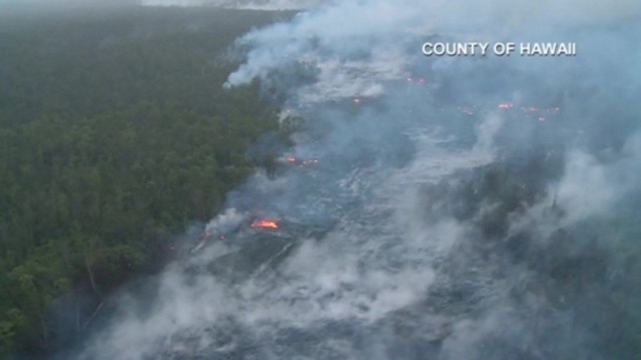 Lava smolders forests in Hawaii