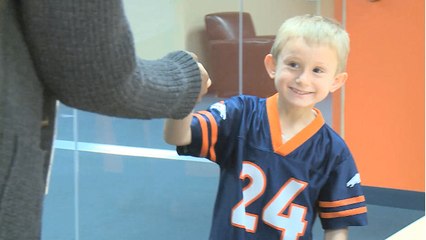 Young Broncos fan gets surprise visit