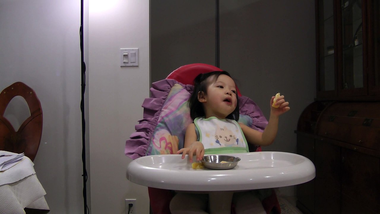 Girl Eating Oranges