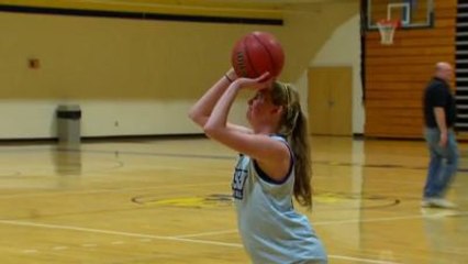 Lauren Hill scores a layup against Bethany College