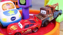 Disney Cars Mater and Lightning McQueen Unboxing of V-Tech Police Station Go Go