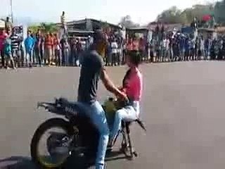 Hot girl one wheeling with boyfriend