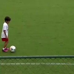 Ronaldinho Gaúcho juggling with a fan..