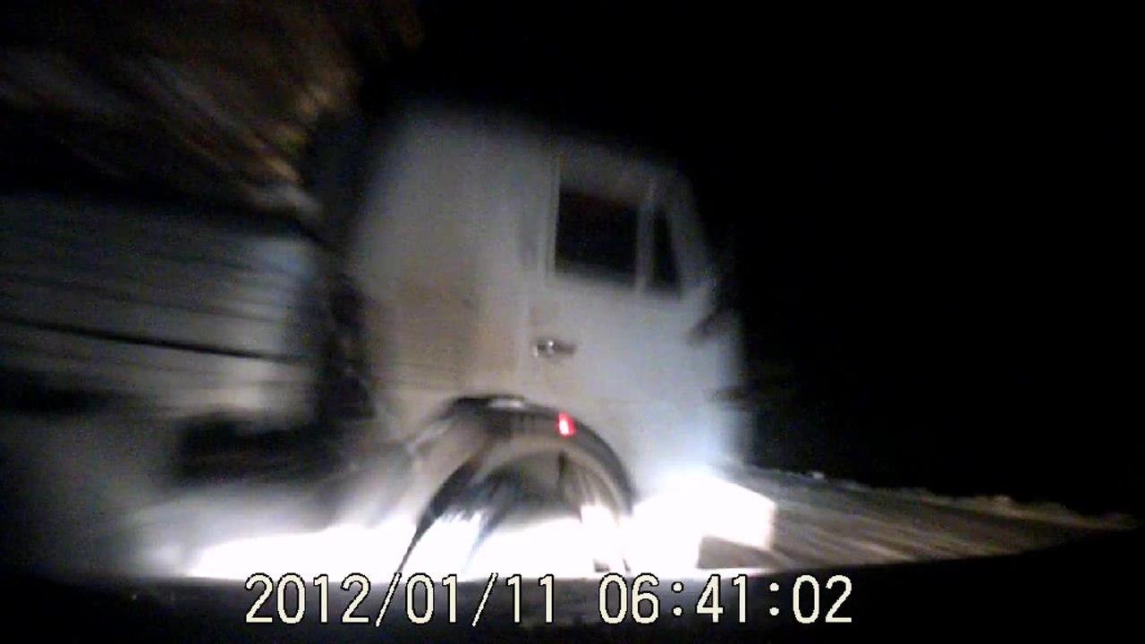 Timber truck stalls in the road causing an accident