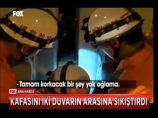 Kafasını iki duvarın arasına sıkıştıran çocuğu yağlayarak çıkardılar