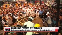 Police clear out protest site in Hong Kong