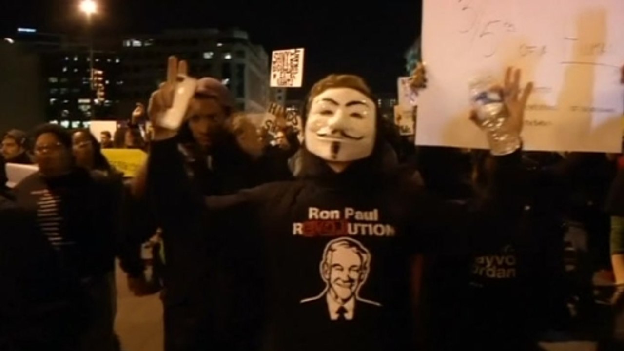 Protesters march in DC against Ferguson decision