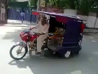 Chingchi Rickshaw Doing One Wheeling