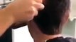 Hairdresser Uses Lighter To Cut Guy's Hair