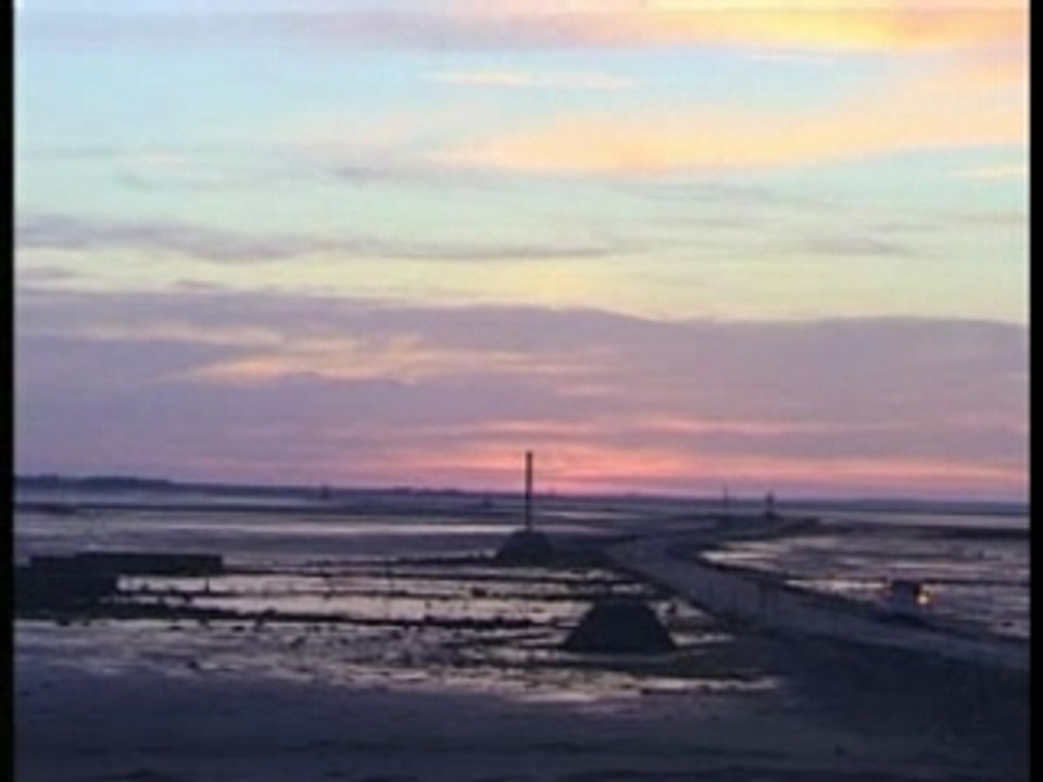 Coucher de soleil sur le passage du Gois