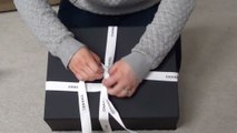 Fashionistas unbox designer purses on YouTube