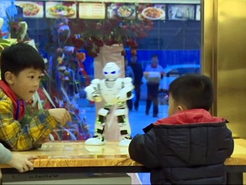 China_ Robots serve people in restaurants