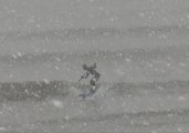 Surfing Through a Snow Blizzard