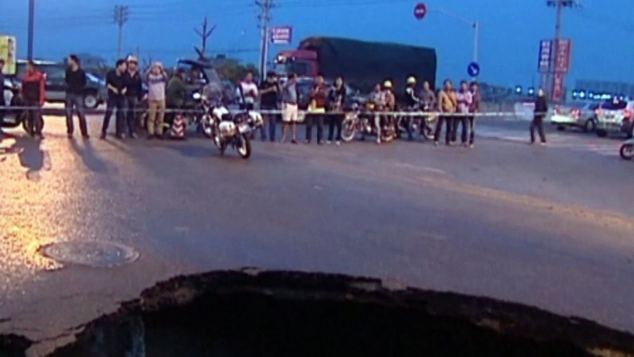 Sinkhole swallows car in China