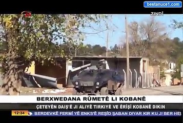 Download Video: IŞİD Türk Askeri gözetiminde Toprak Mahsulleri Ofisin'den Kobanî'ye saldırıyor