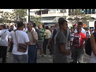 Vigilantes cruzam os braços e protestam no Centro