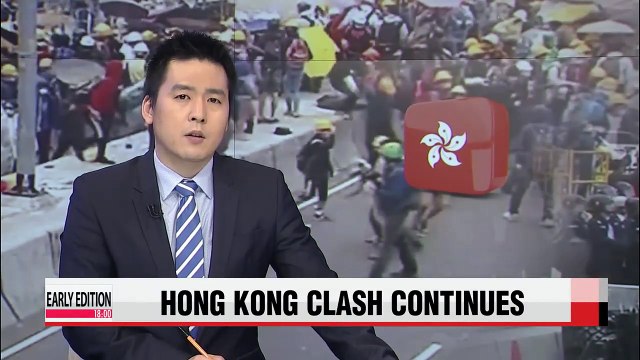 Hong Kong demonstrators clash with police near heart of financial district