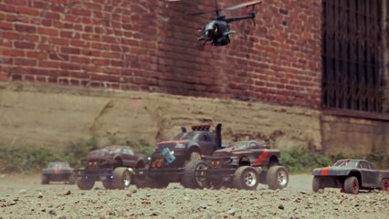 Action video pits laser-firing drones against remote-control cars… and a dog