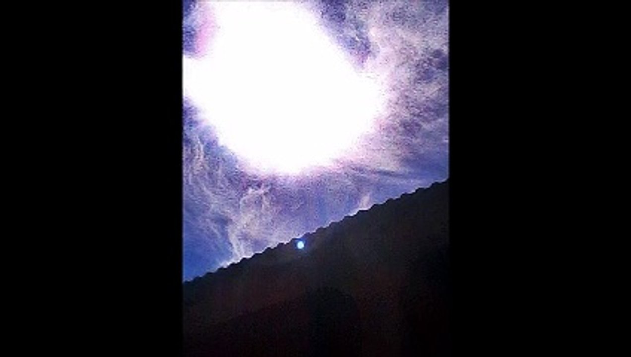 GIANT CLOUD BEING BY THE SUN