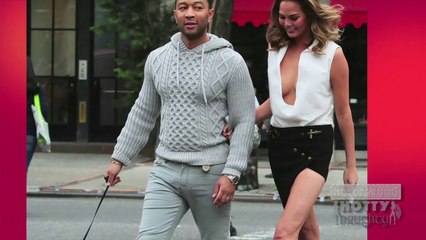 Chrissy Teigen lets it all hang out for the paparazi