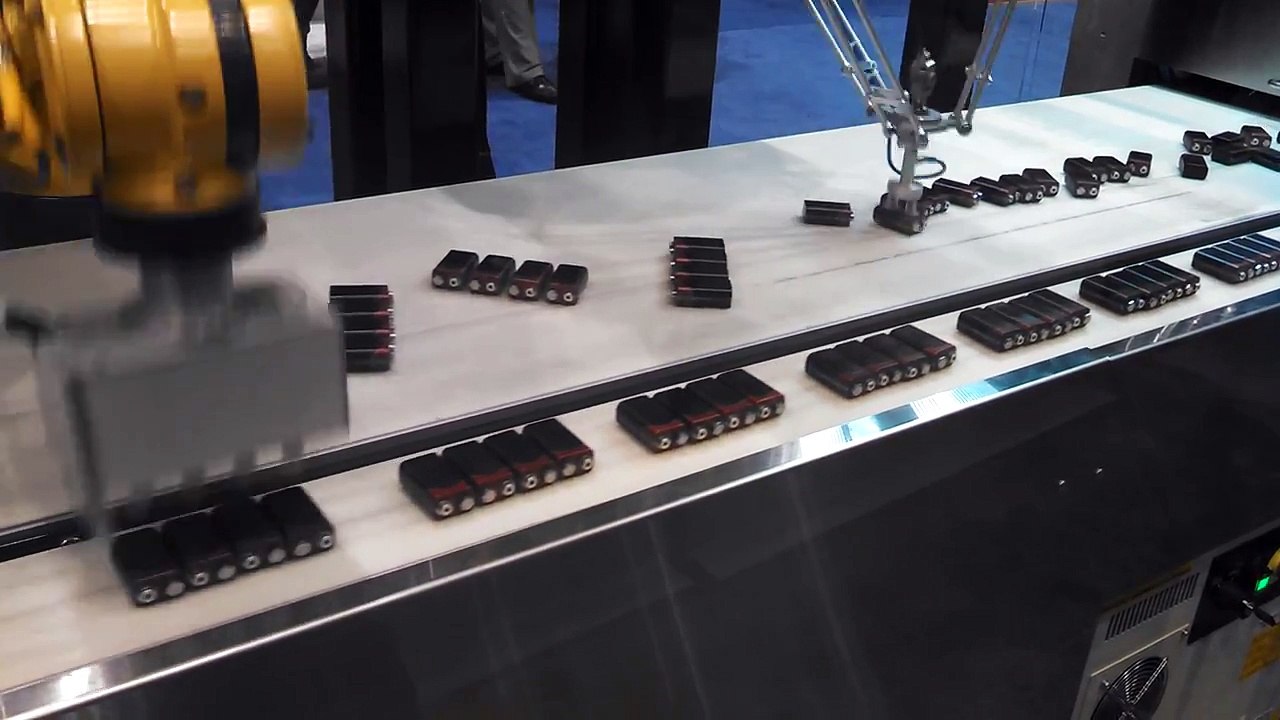 The Fanuc robot programmed to pack batteries ... Hypnotic