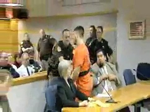 Cop-Killer Suspect Lunges At Victim's Family