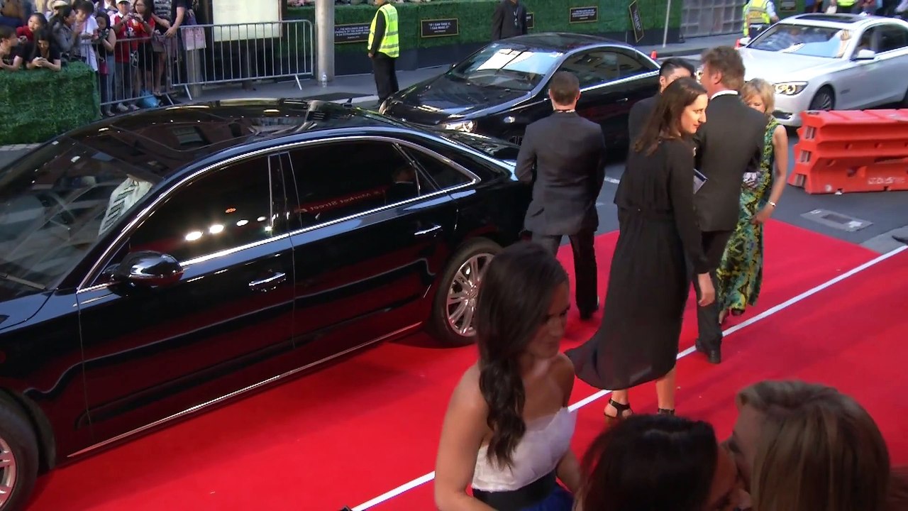Angeline Jolie and Brad Pitt take selfies with fans at UNBROKEN Premiere