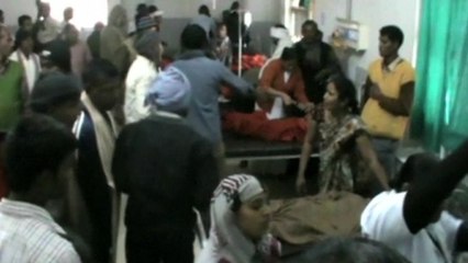 Train slams into school bus in northern India, killing five and injuring 25